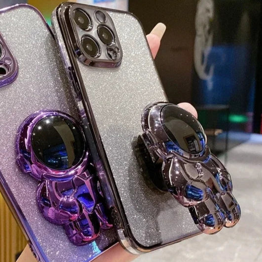 Luxury Glitter Astronaut Folding Silicone Case with Stand and Hand Holder for Apple iPhone 16/15/14/13/12 Pro Max Plus Mini | Shockproof, Water-Resistant & Anti-Fingerprint
